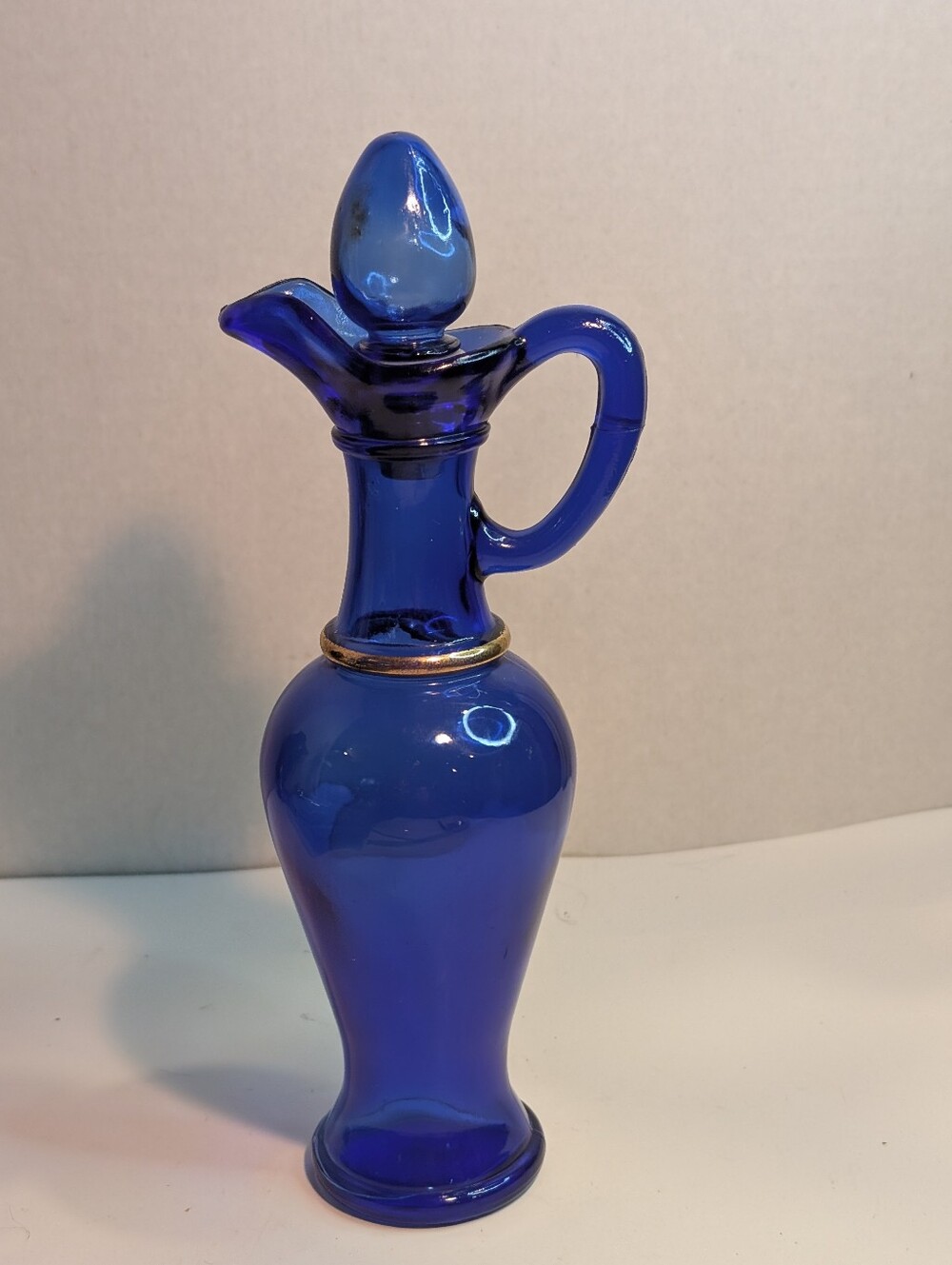 Blue Glass Greek Style Pitcher Avon Skin So Soft Vintage Gold Details With Top.